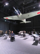 「十二試艦上戦闘機」の実物大模型の写真。１階A2には零戦試作初号機が宙吊りで展示されています。